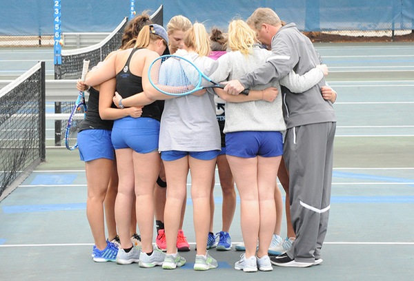 The team huddles together prior to the start of a match.